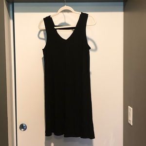 Black sleeveless swing dress